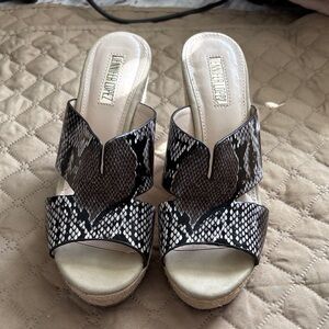 Jennifer Lopez Black and White Snake-Print Wedge Sandals